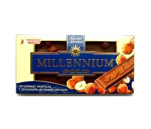 Шоколад Millennium Gold молочный с орехами 33 100г 1057579