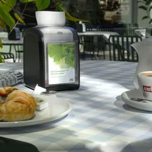 Диспенсер настільний для серветок Tork чорний розмір 141х113х170мм Вміщує 168 серветок 272900, Тримачі для серветок - фото 5